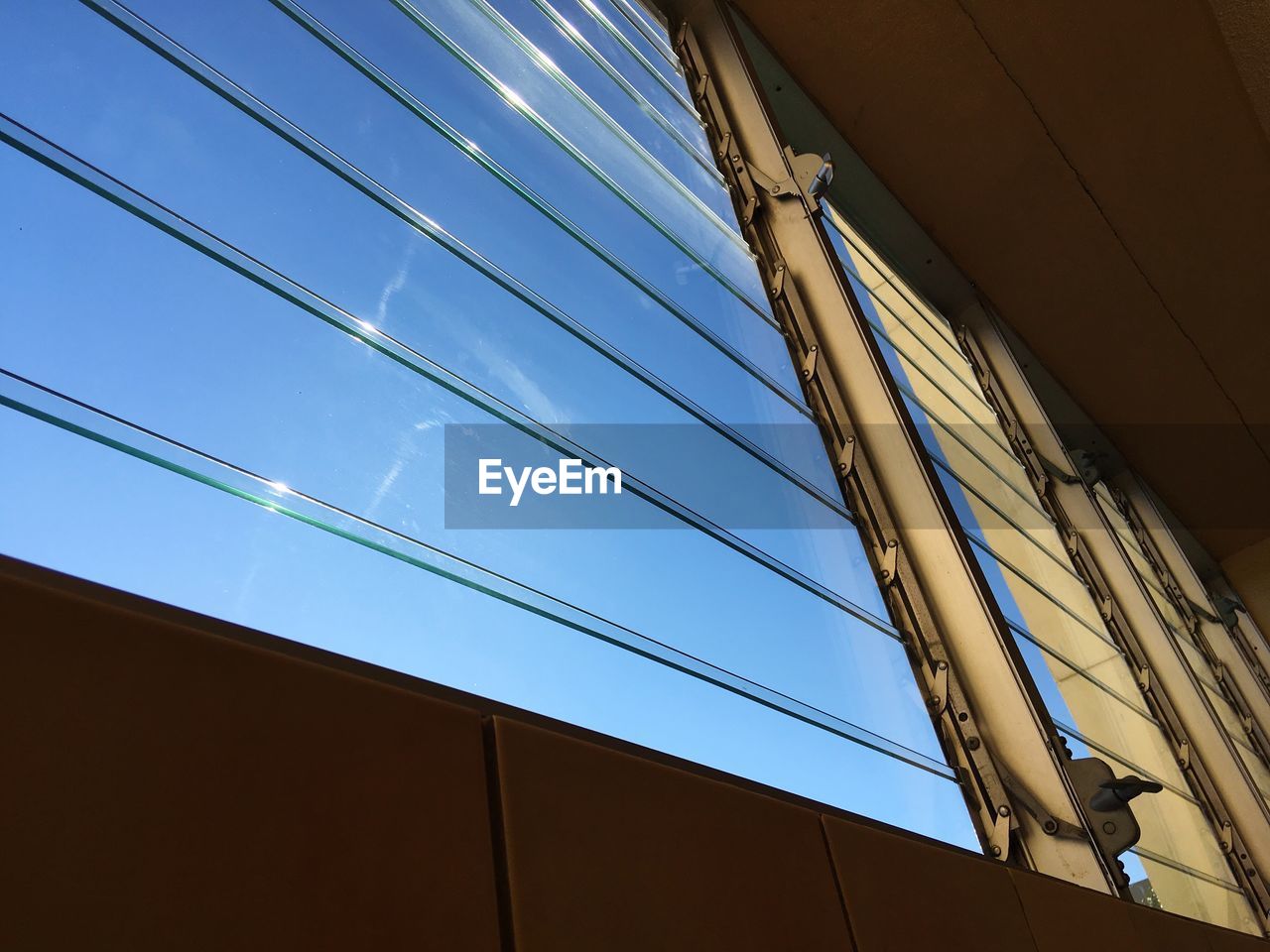 LOW ANGLE VIEW OF CABLES AGAINST SKY