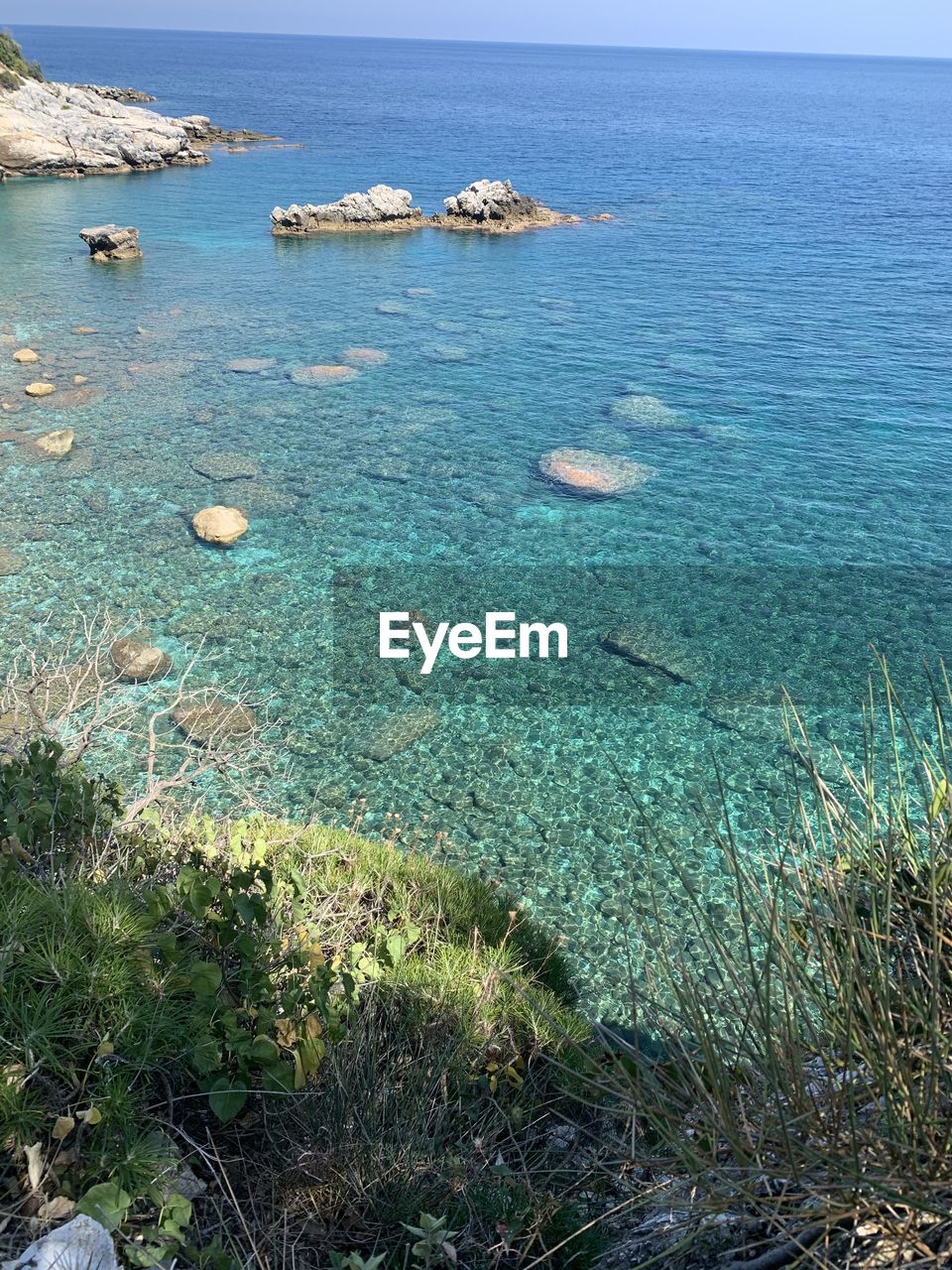 HIGH ANGLE VIEW OF SURF ON SHORE