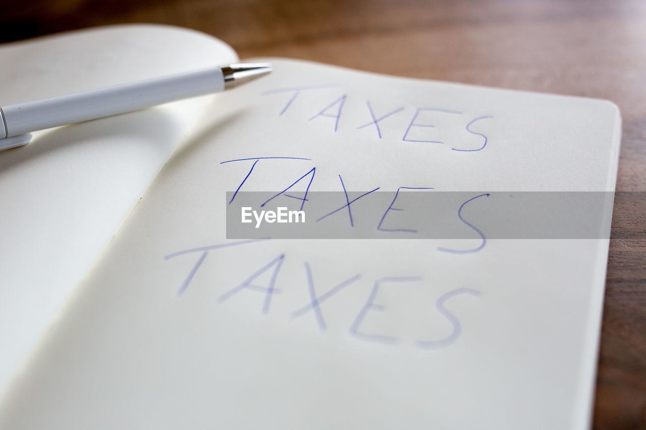 Taxes written in book