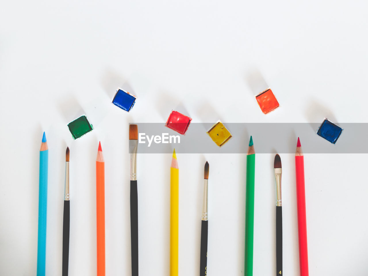 Directly above shot of art and craft equipment on white background