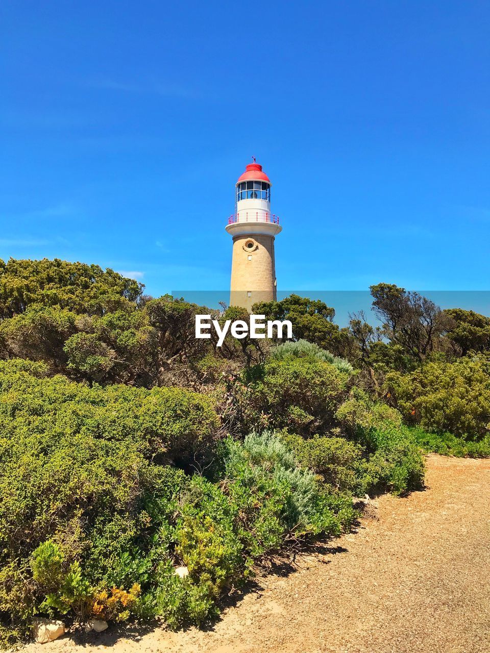 LIGHTHOUSE AGAINST CLEAR SKY