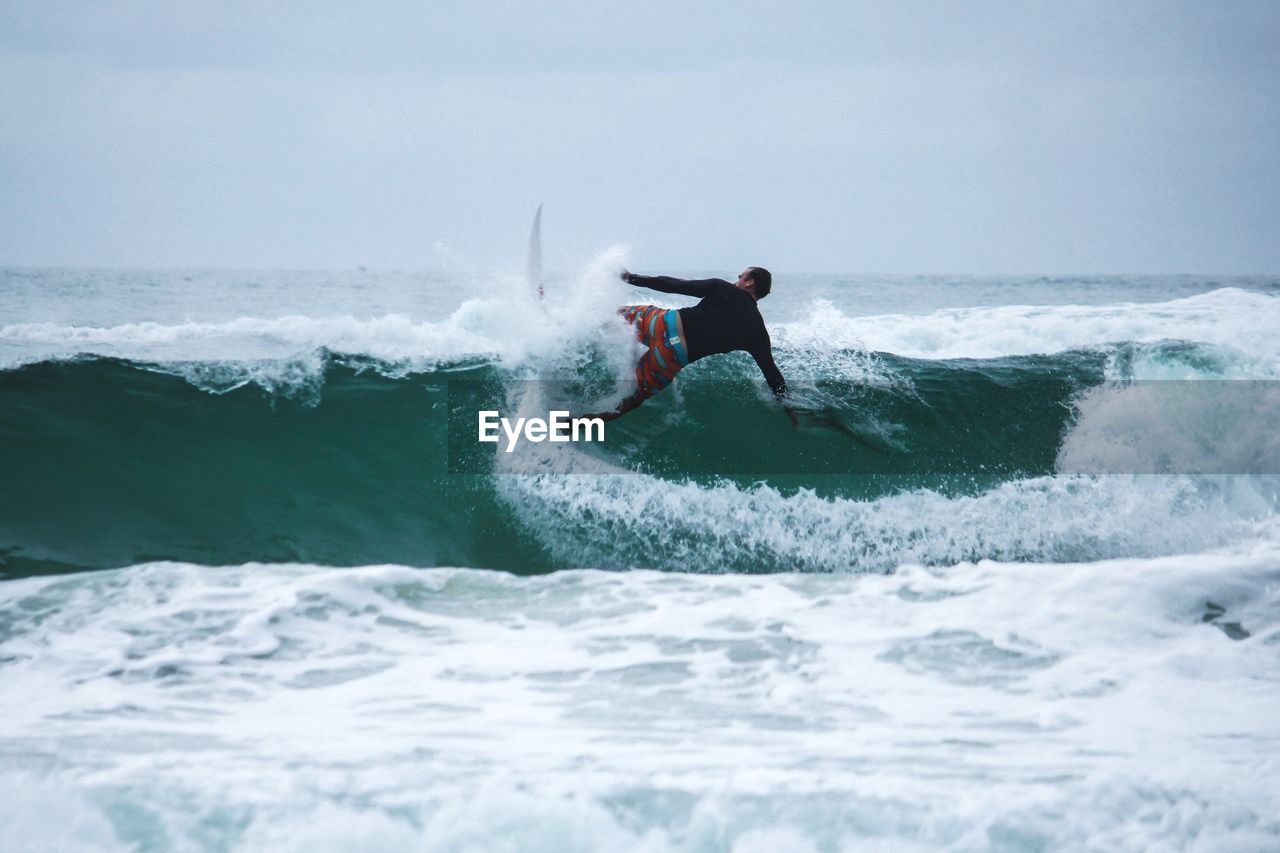 Man surfing in sea