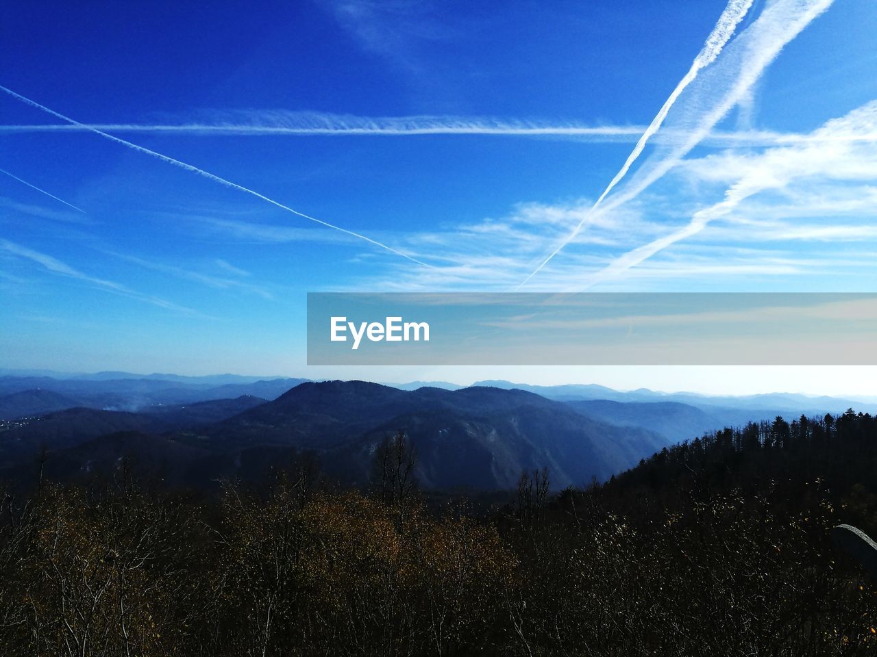 SCENIC VIEW OF LANDSCAPE AGAINST BLUE SKY