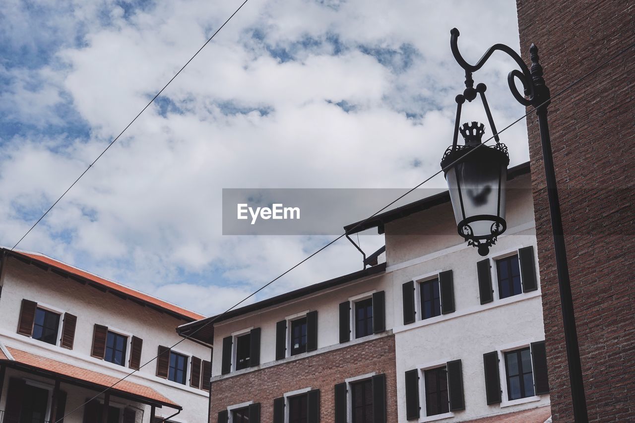 Low angle view of residential building against sky