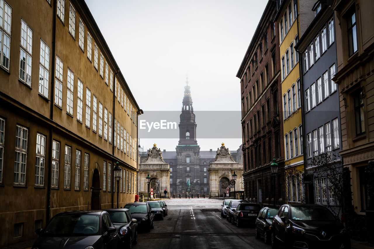 Road leading towards historic building in city