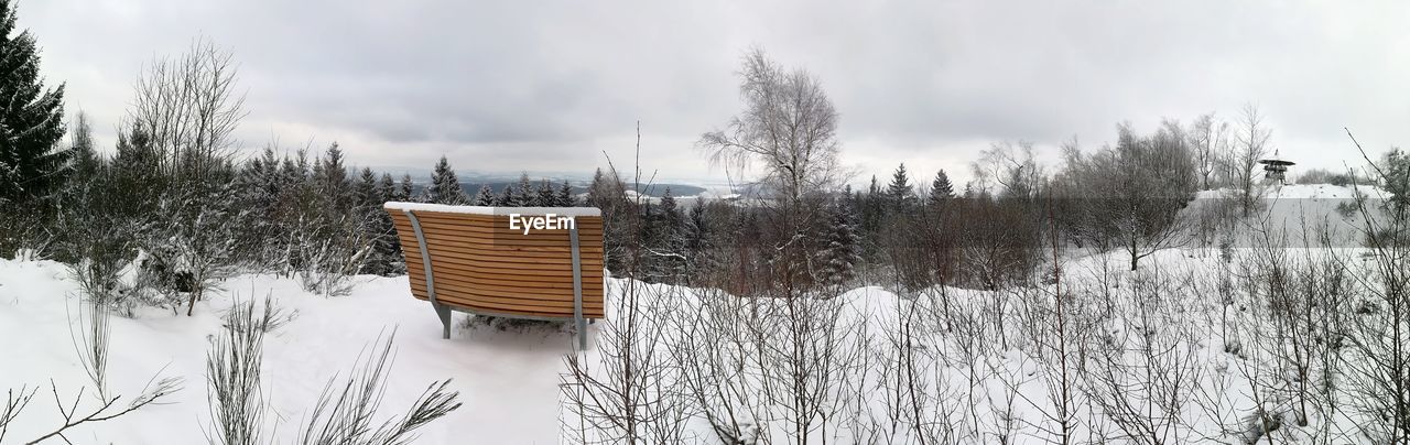 PANORAMIC VIEW OF TREES ON FIELD AGAINST SKY