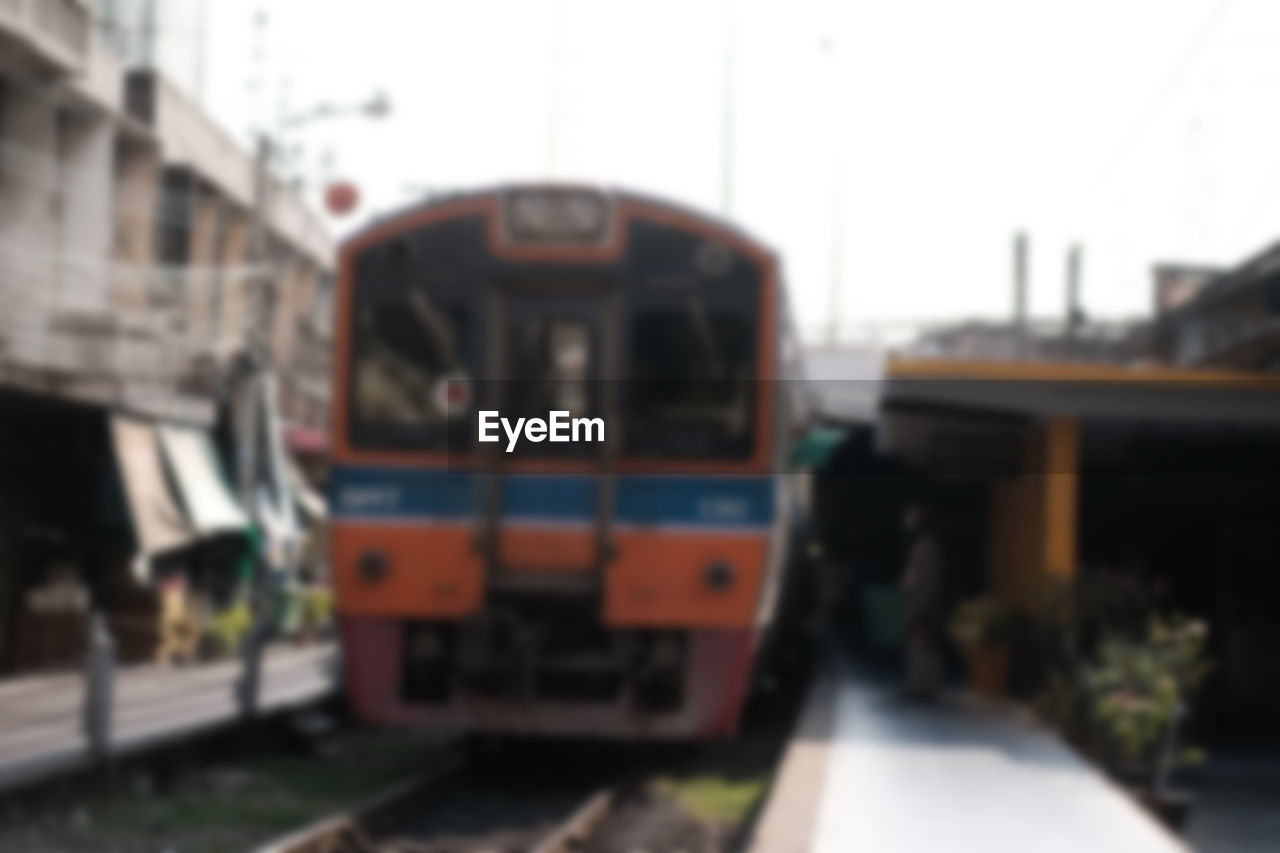 TRAIN AT RAILROAD STATION PLATFORM