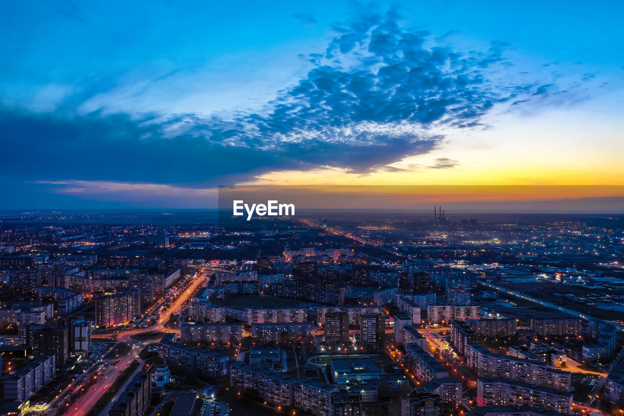 A bird's eye view of the modern district of the city of togliatti in the evening after sunset.