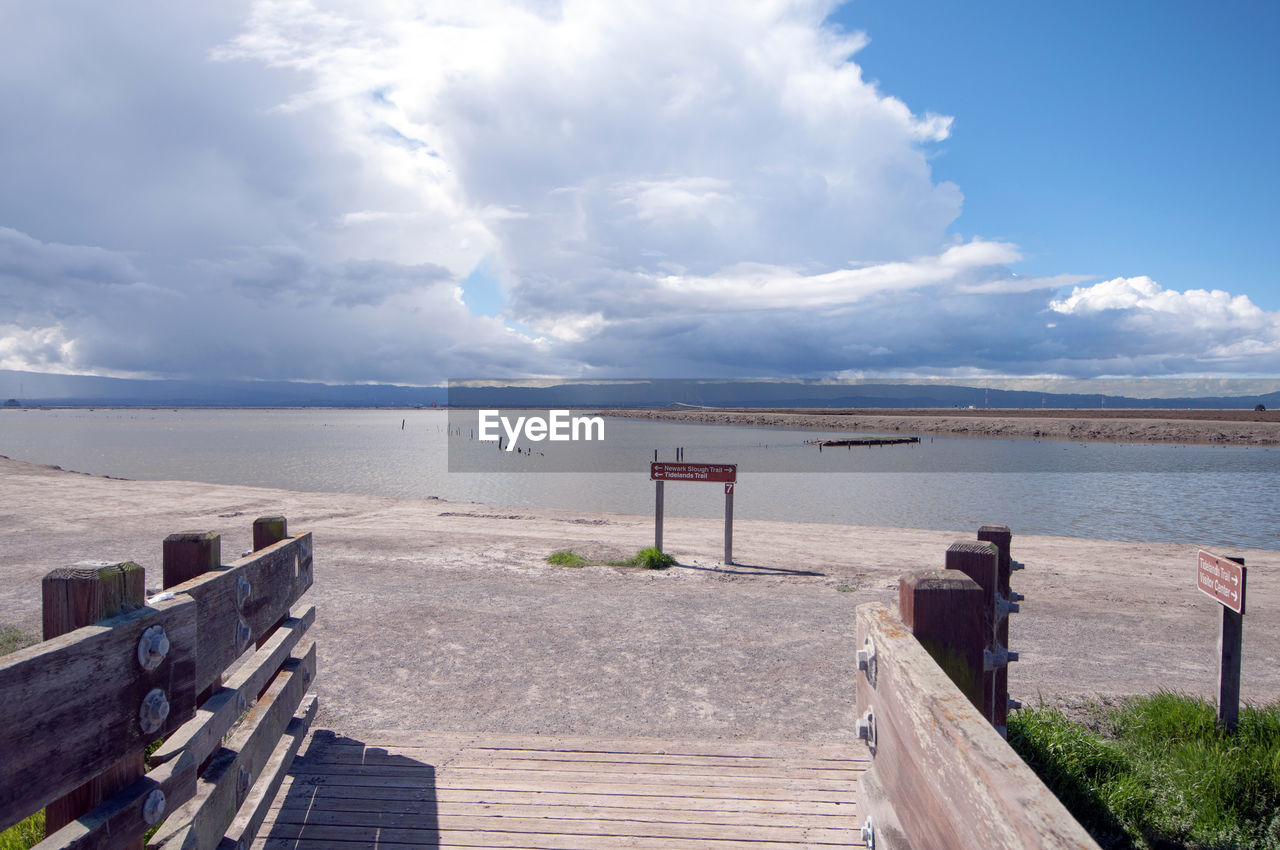 Pier over sea against sky