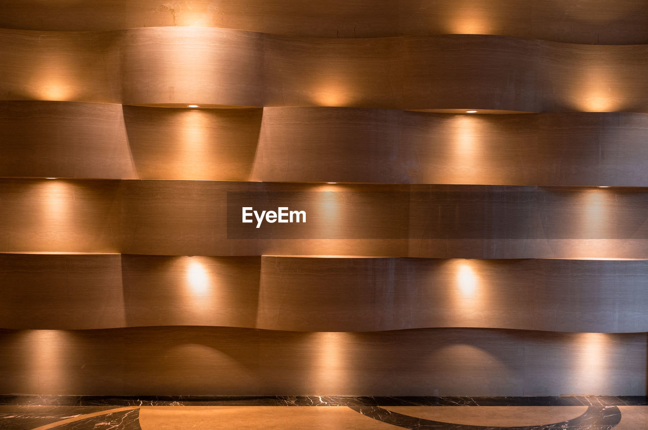 Close-up of illuminated wooden wall