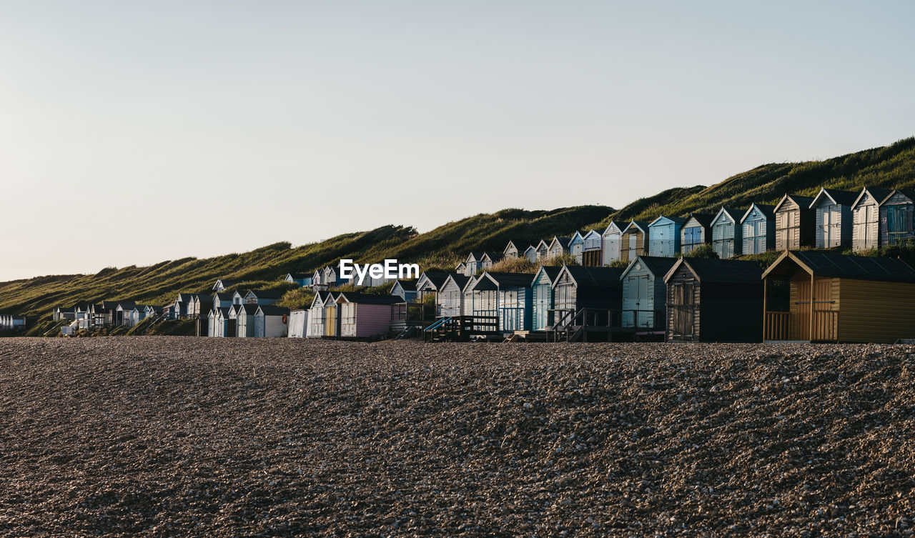 Beach huts against sky