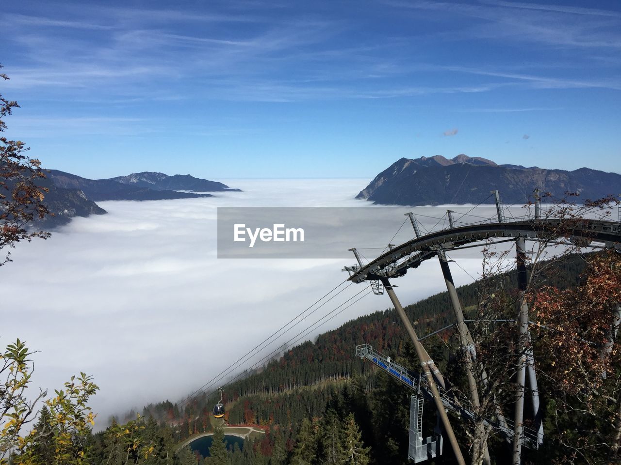 Scenic view of cloudscape and mountains against sky