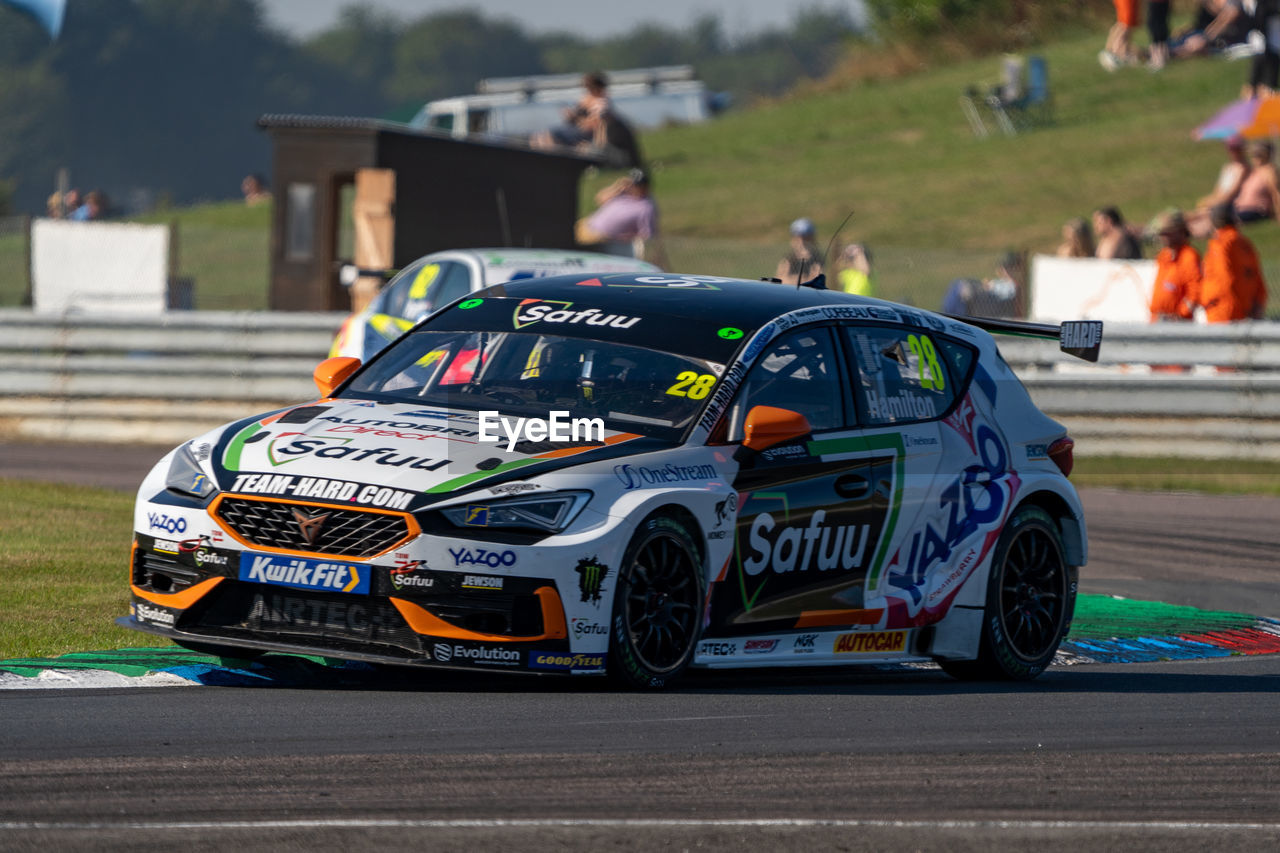 rallycross, car, transportation, mode of transportation, sports, automobile, auto racing, motorsport, motor vehicle, racing, touring car, vehicle, race, race track, world rally car, road, race car, land vehicle, sports race, rallying, competition, driving, day, track and field event, sports car, architecture, outdoors, motor racing track
