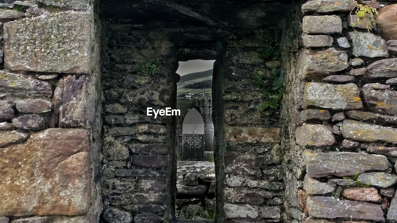 LOW ANGLE VIEW OF STONE WALL