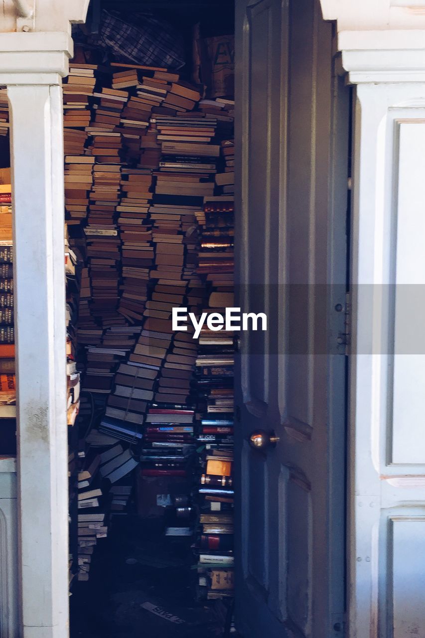 Stacked books at store for sale