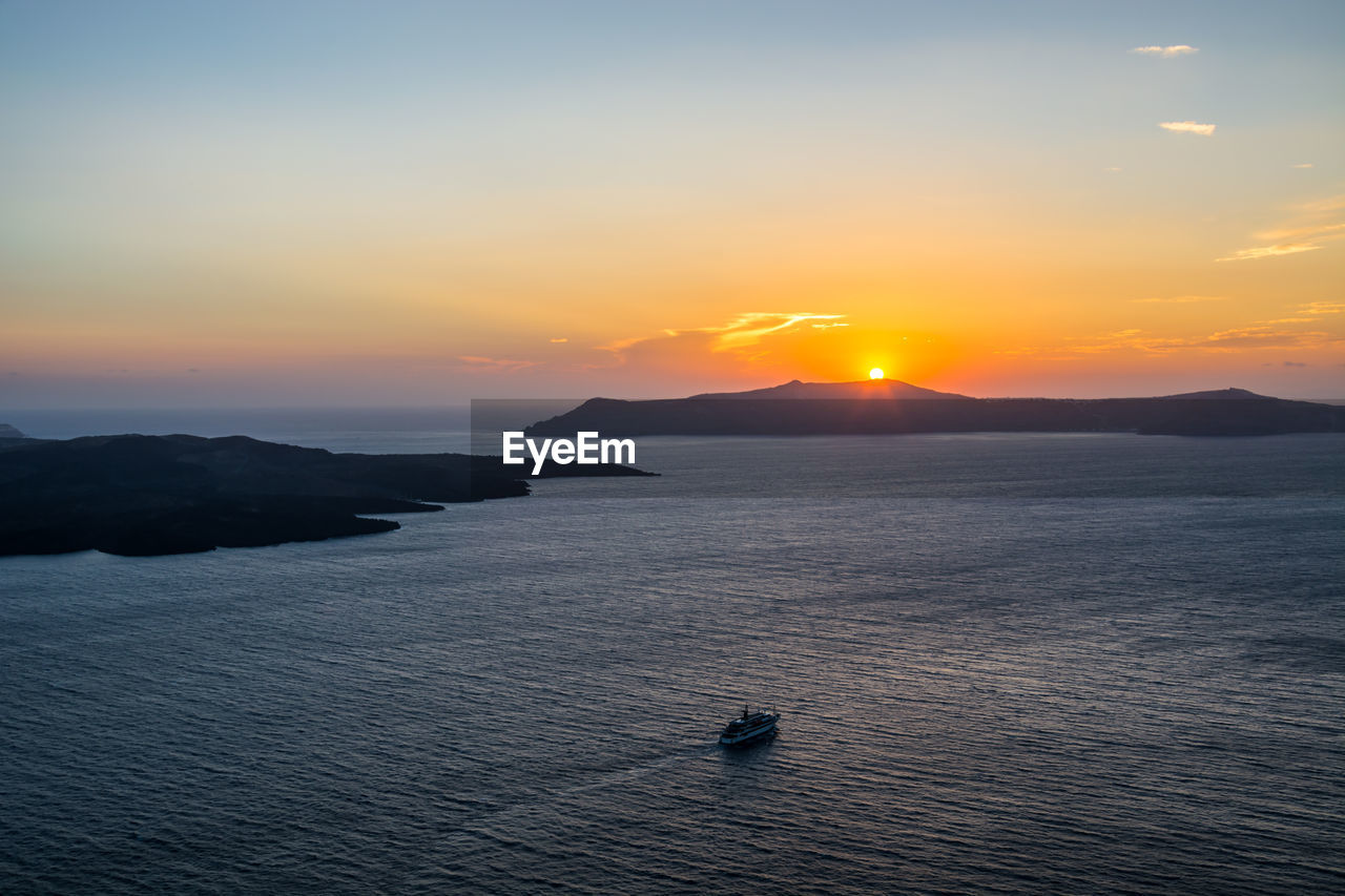 High angle view of sea against sky during sunset