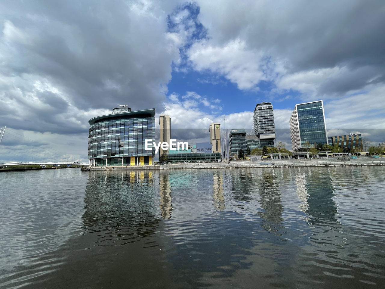 BUILDINGS IN CITY AGAINST SKY