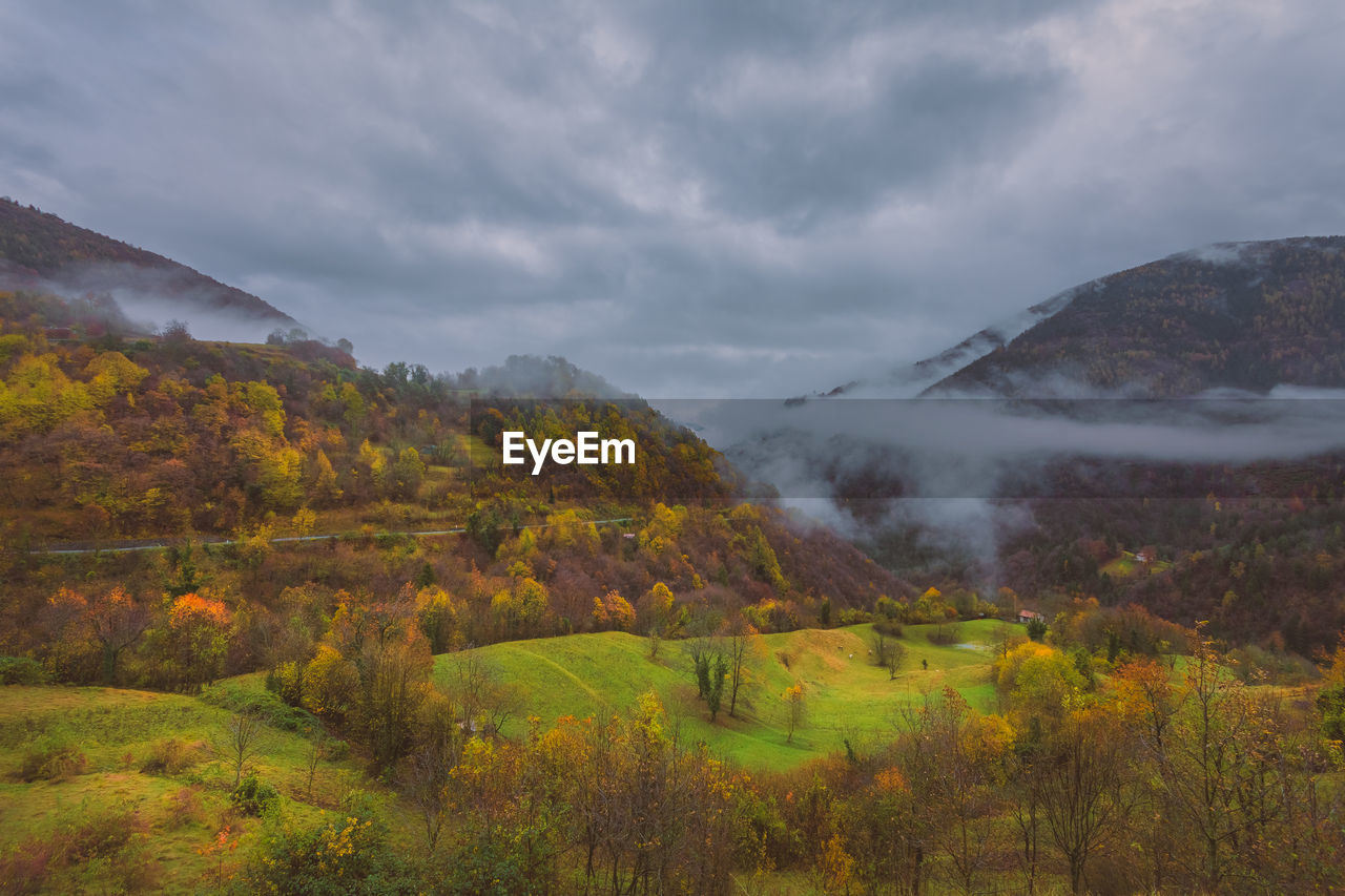 Scenic view of landscape against sky during autumn