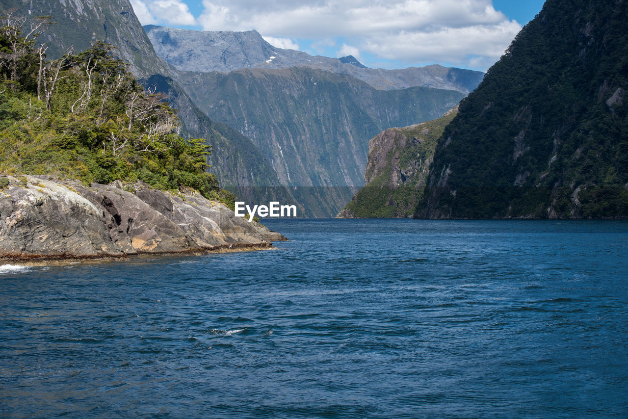 Scenic view of sea and mountains