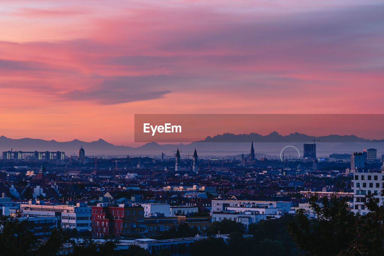 High angle view of munich townscape against sky during sunset 