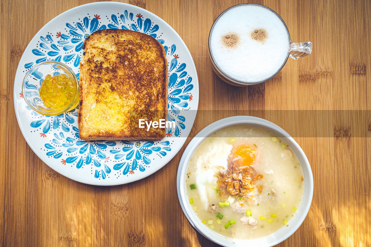 HIGH ANGLE VIEW OF BREAKFAST SERVED WITH COFFEE ON TABLE