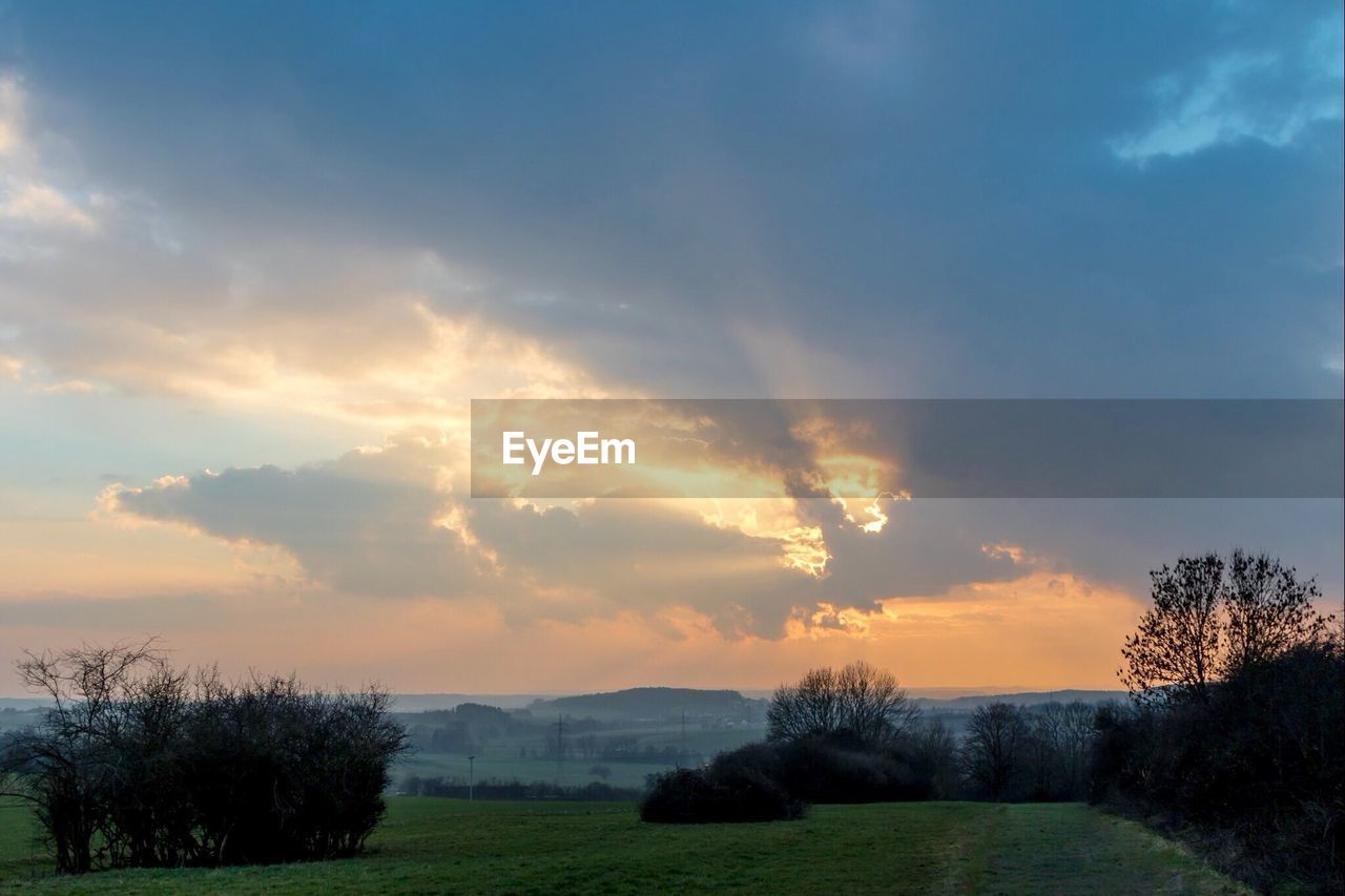 Scenic view of landscape at sunset