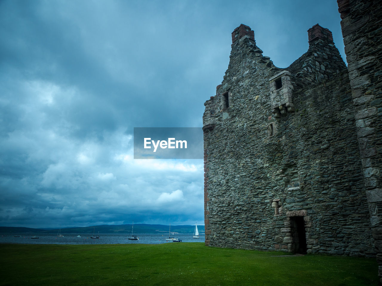 RUINS OF CASTLE AGAINST SKY