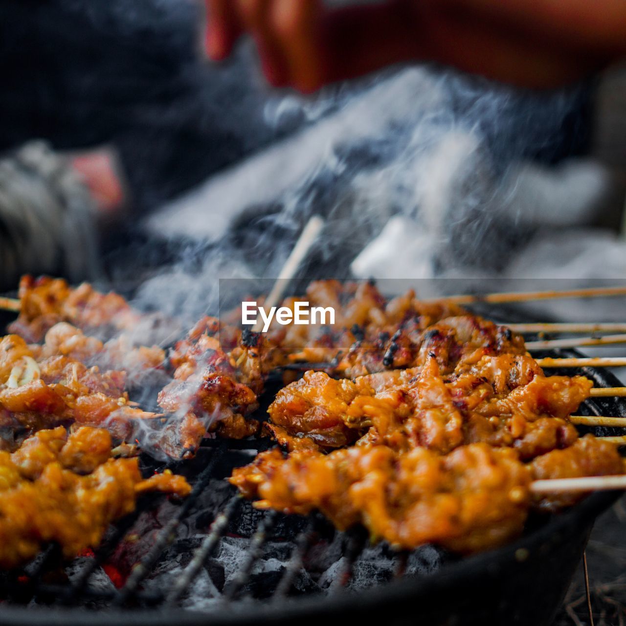 Close-up of meat on barbecue grill