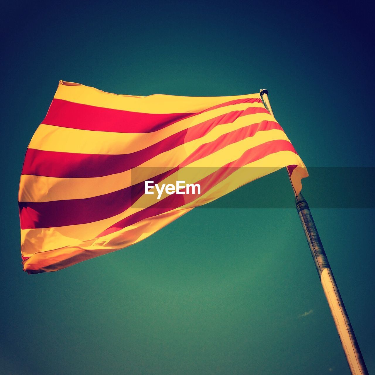 Low-angle view of catalonian flag