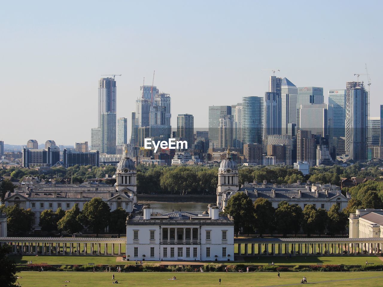 Modern buildings in city against clear sky