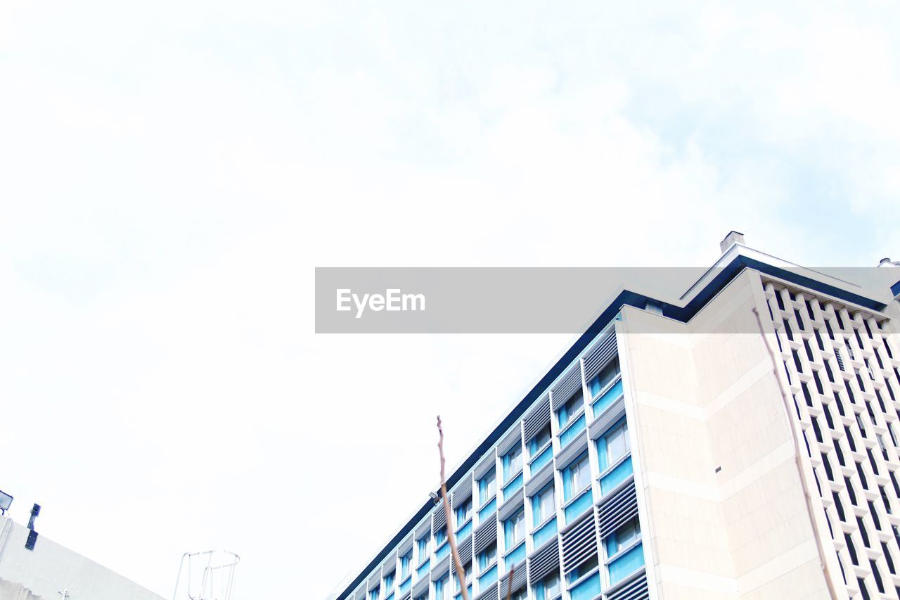 Low angle view of modern building against sky