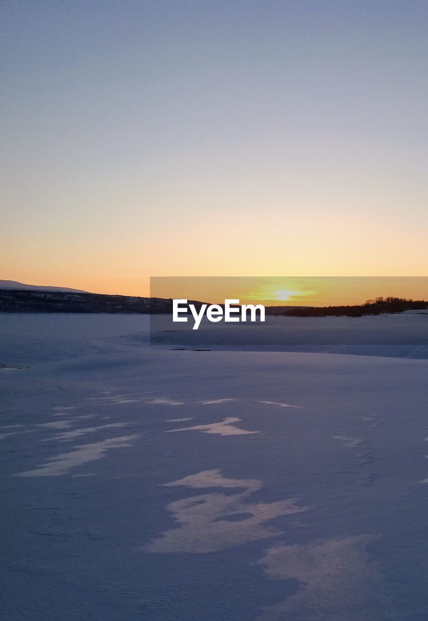 SCENIC VIEW OF SNOW COVERED LANDSCAPE