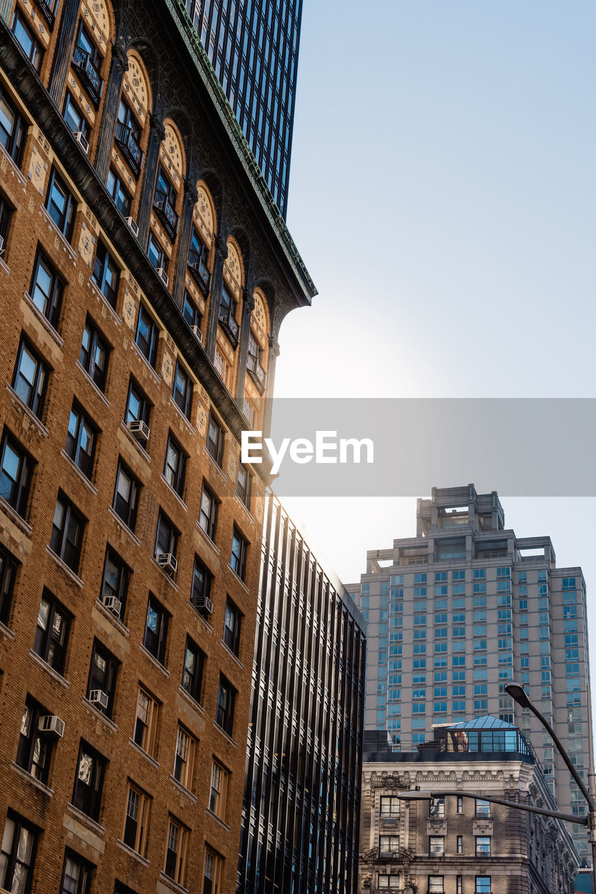 Low angle view of buildings against sky