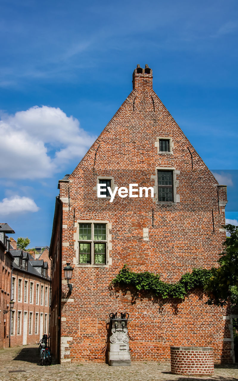 Old flemish building against sky