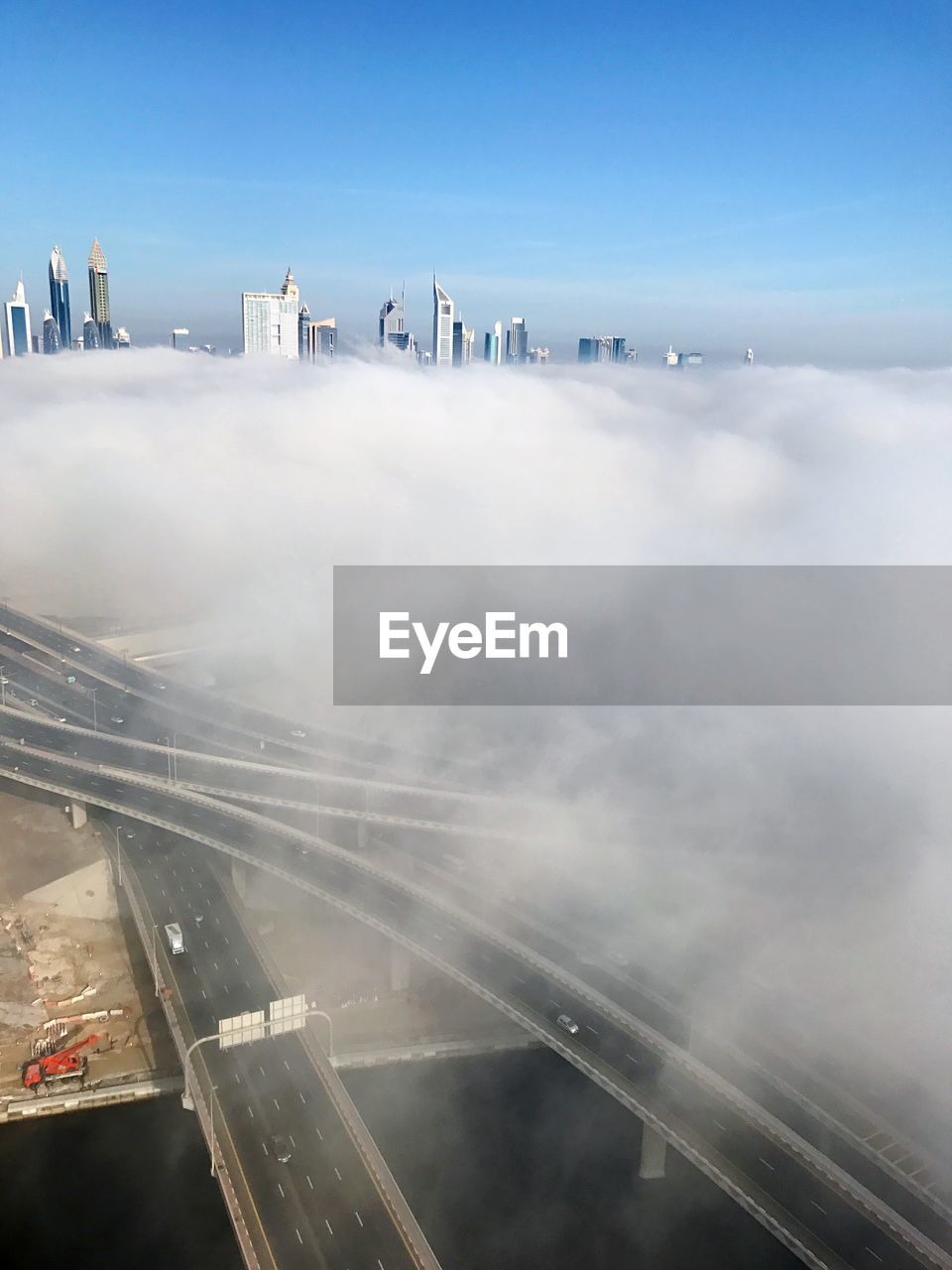 Cloudscape over highways in city