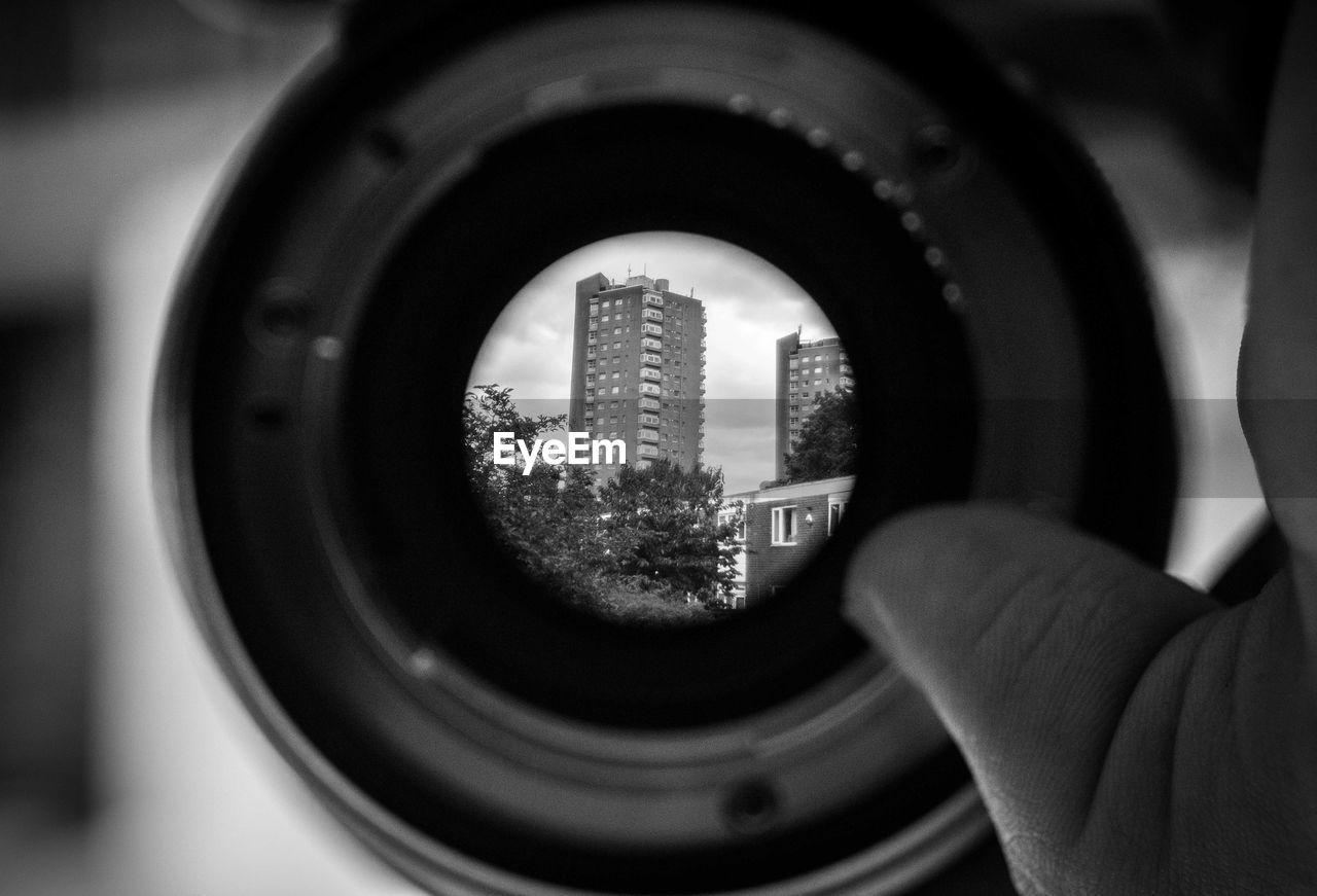 CLOSE-UP OF A MAN WITH CAMERA
