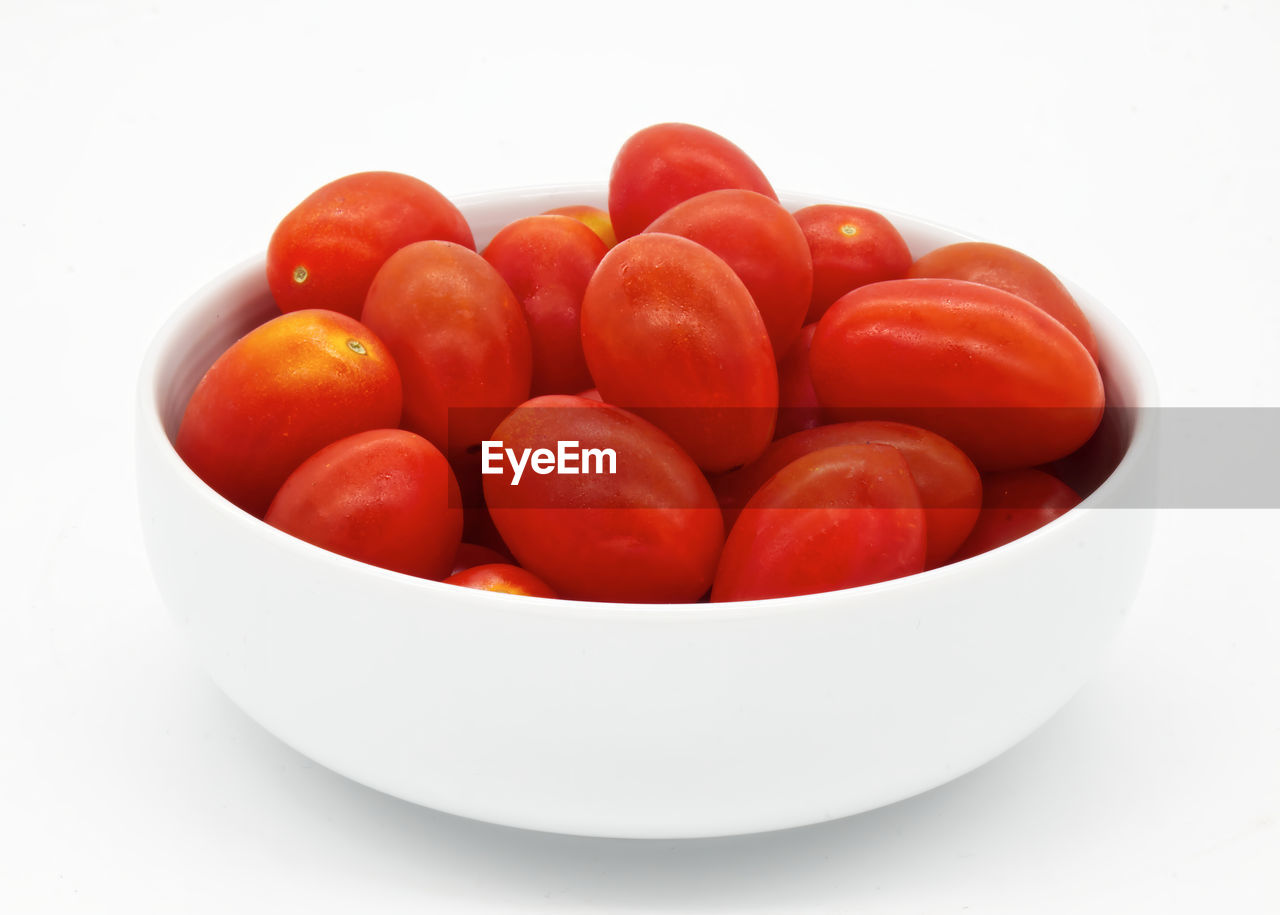 tomato, food, food and drink, healthy eating, vegetable, fruit, produce, wellbeing, plum tomato, freshness, red, plant, bowl, cut out, studio shot, white background, no people, indoors, large group of objects, group of objects, close-up, still life, ripe, group, raw food, organic, heap, white