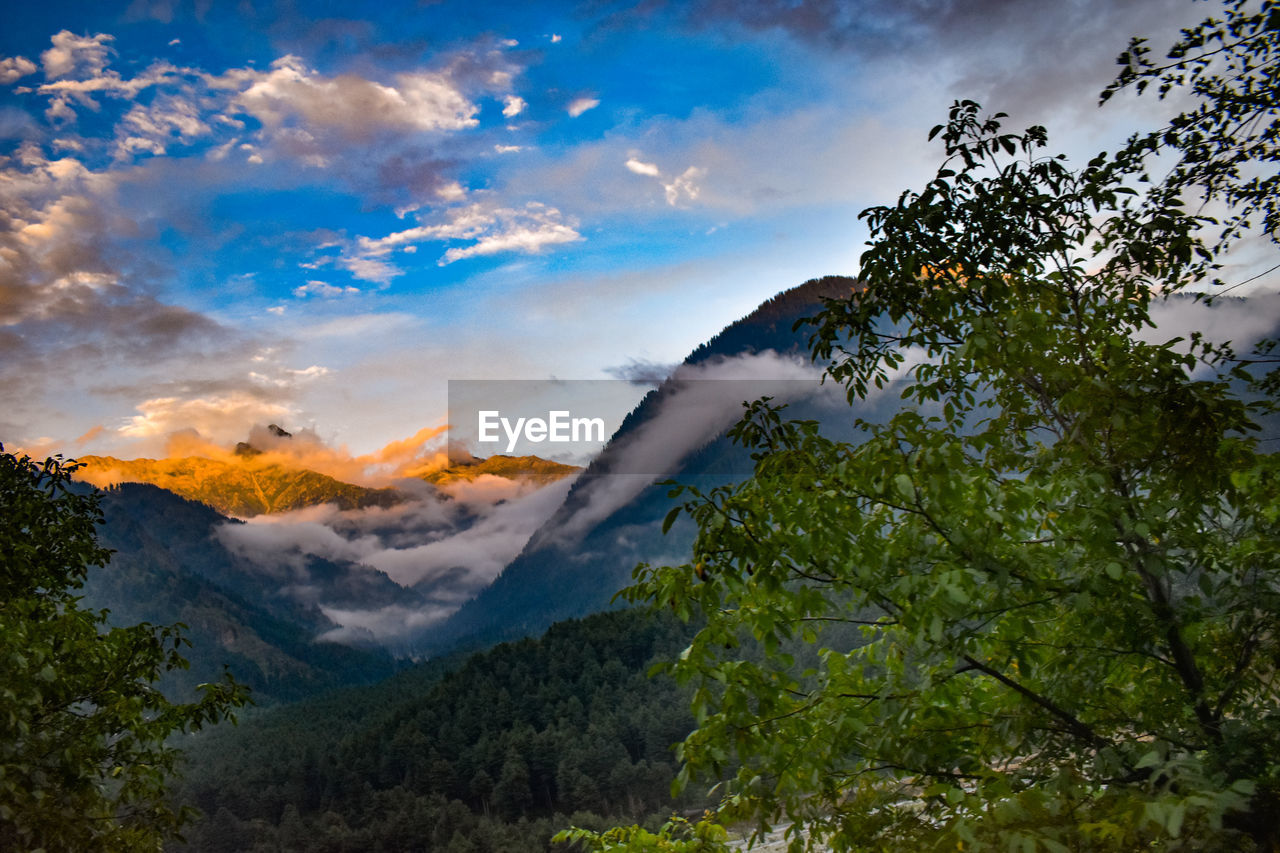 Low angle view of mountain against sky during sunset