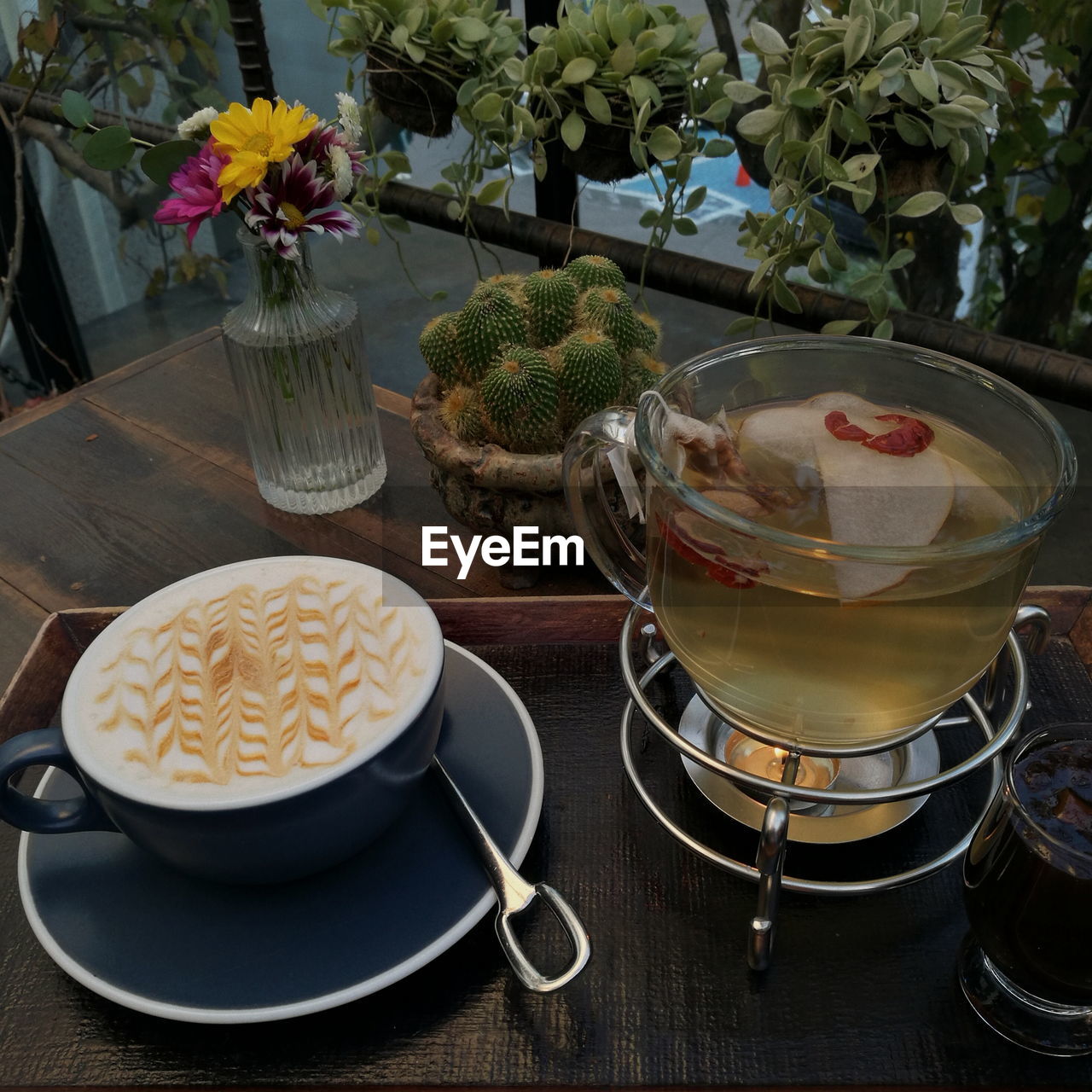 HIGH ANGLE VIEW OF TEA ON TABLE AT HOME