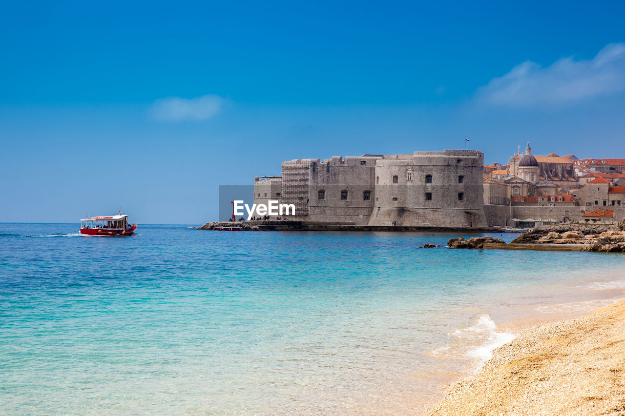 The beautiful banje beach and dubrovnik city