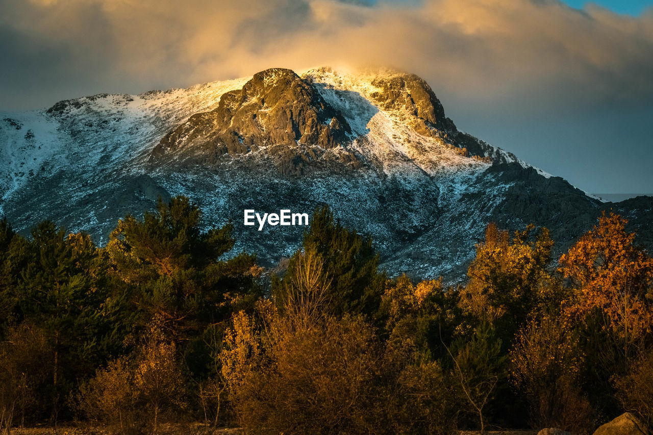 Scenic view of mountain against sky during winter