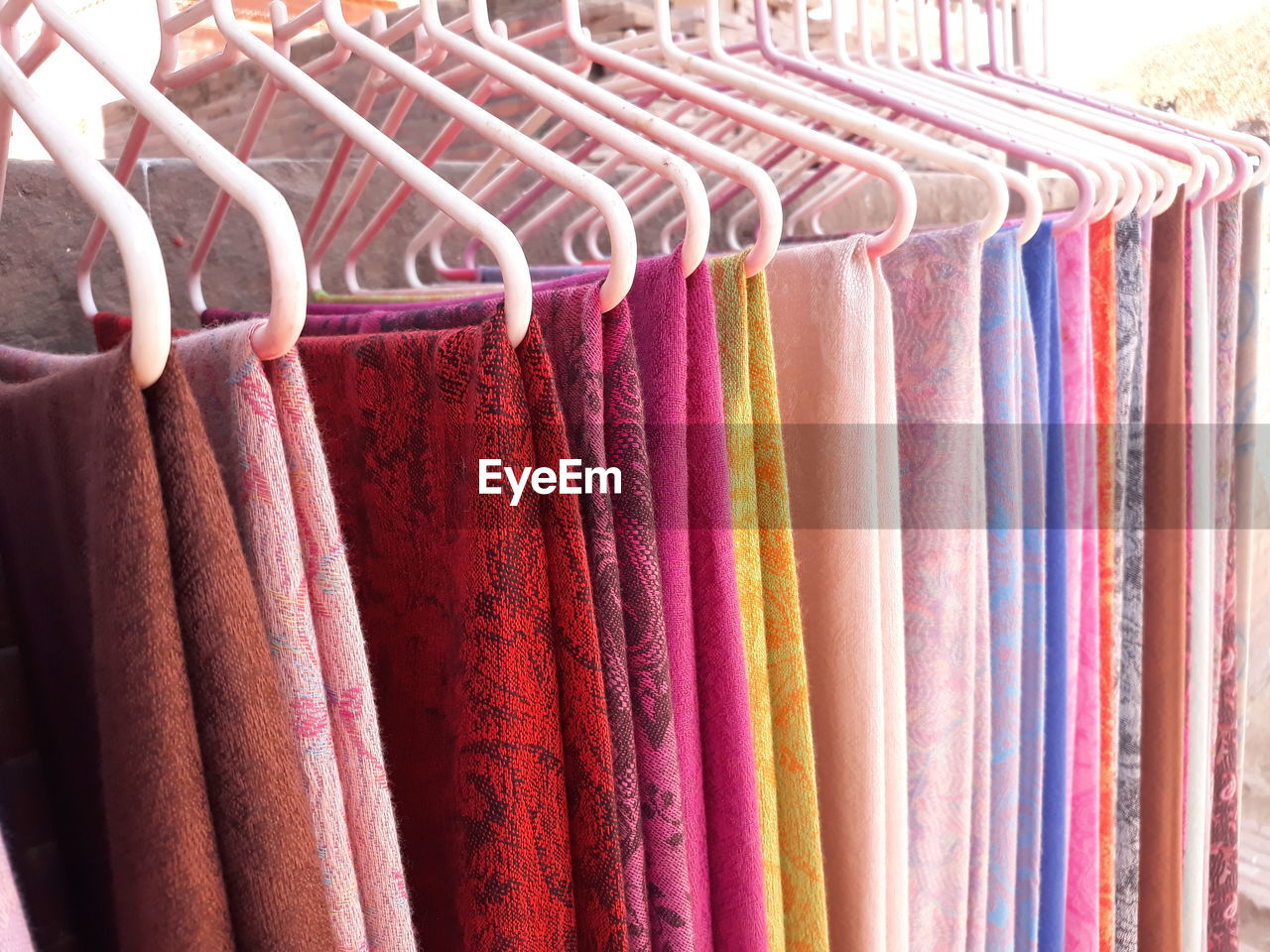 Close-up of multi colored clothing in store