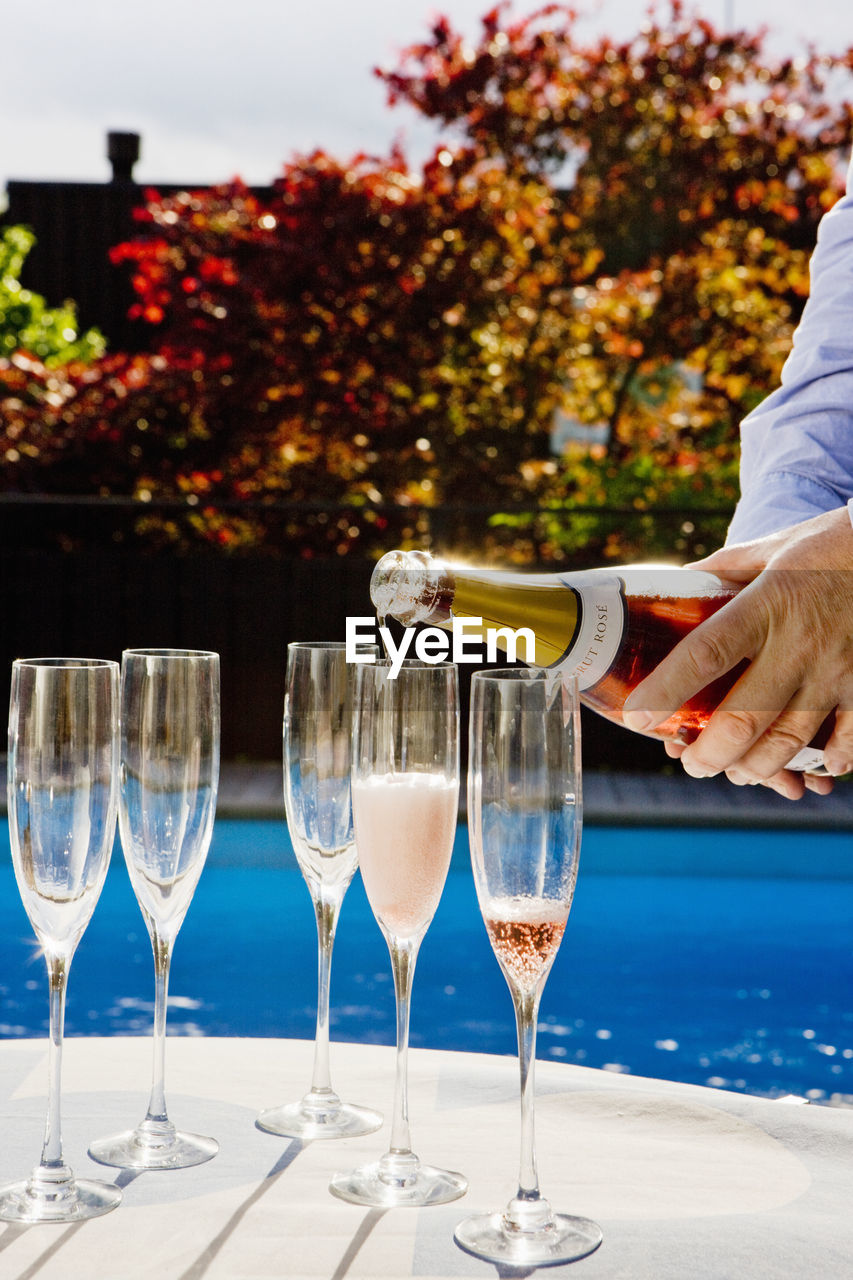 Man pouring champagne, close-up