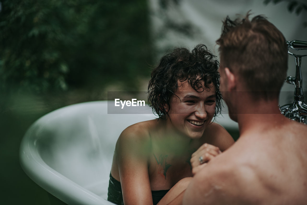 Portrait of shirtless man in water