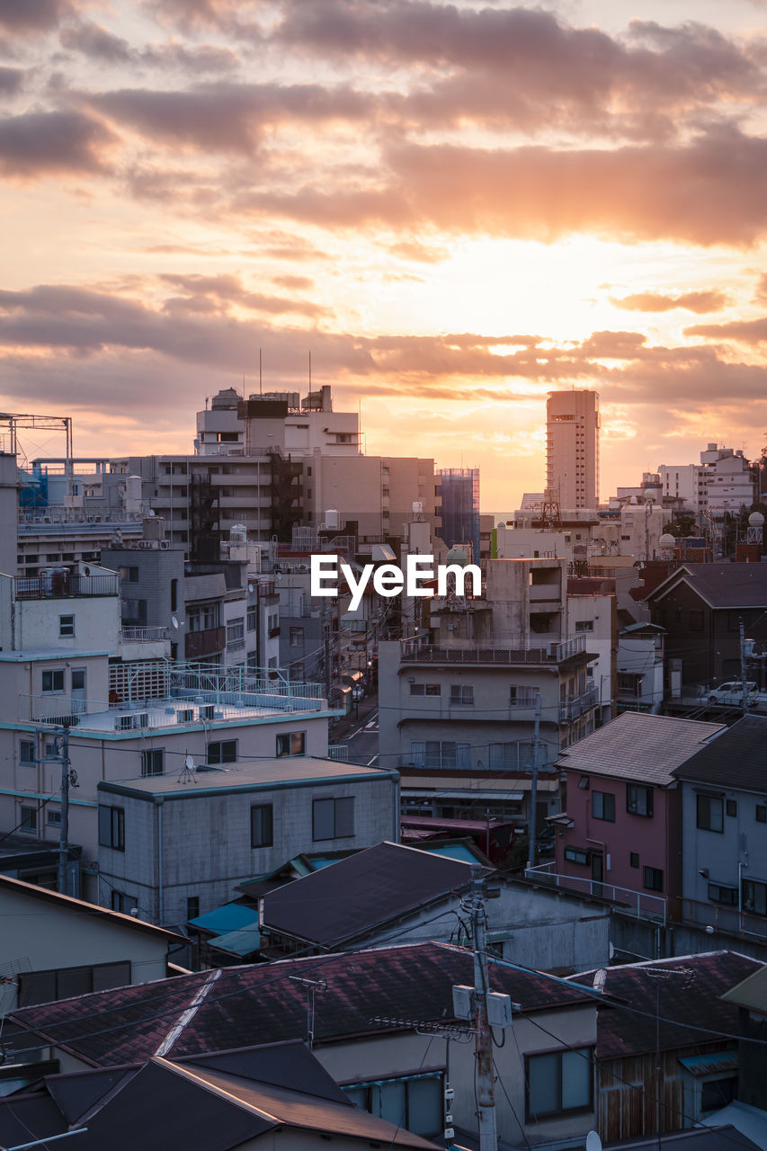 View during sunrise in atami, japan from the rooftop. portrait orientation.