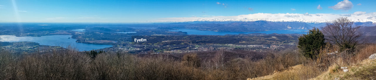 Wide angle view of the lake maggiore and the alps from mount campo dei fiori.