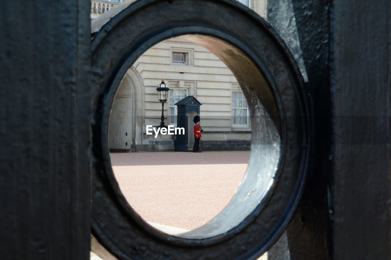 British royal guard seen through fence