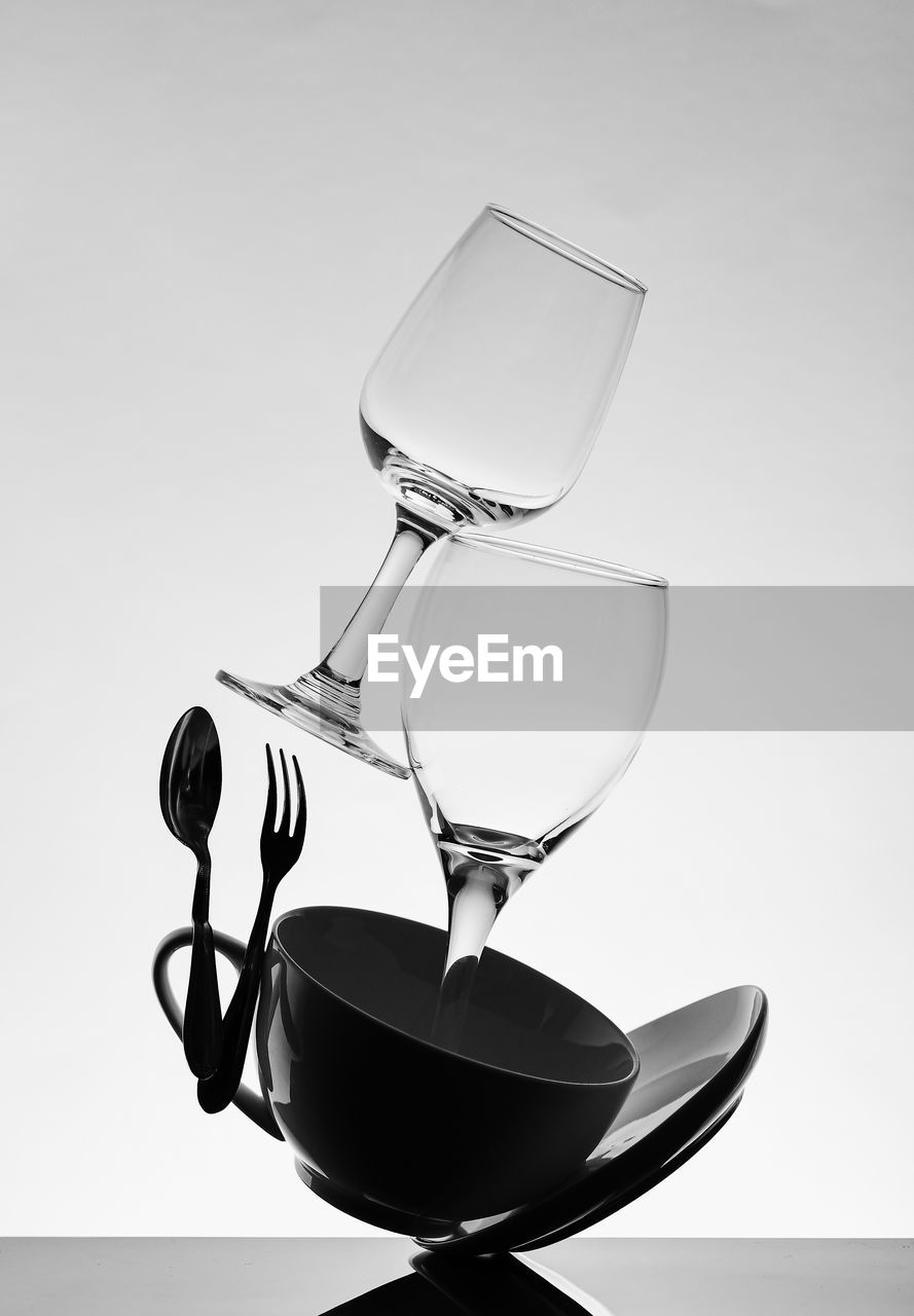 Close-up of glasses against white background