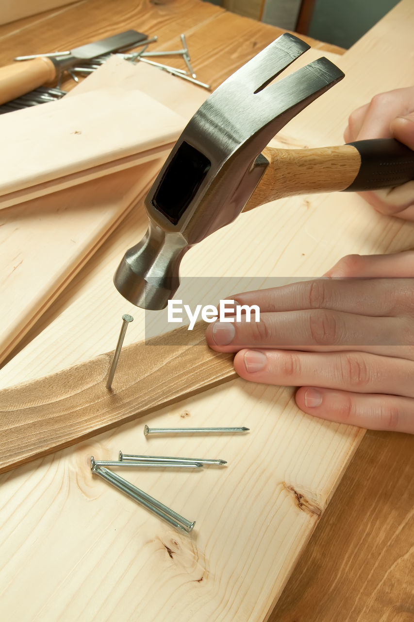 Close-up of man working on table