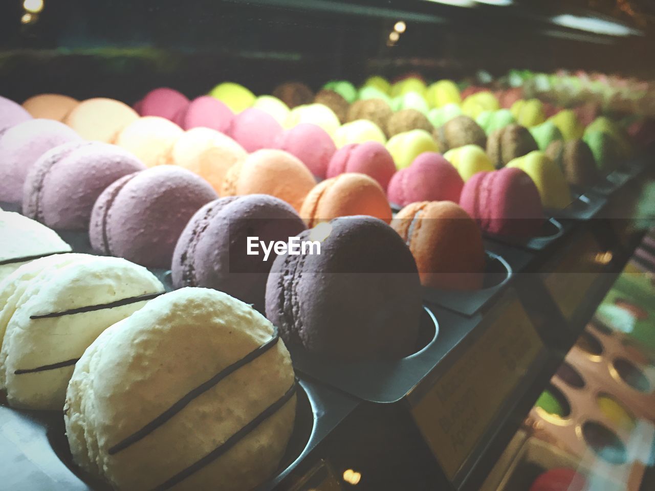 High angle view of macaroon for sale in shop
